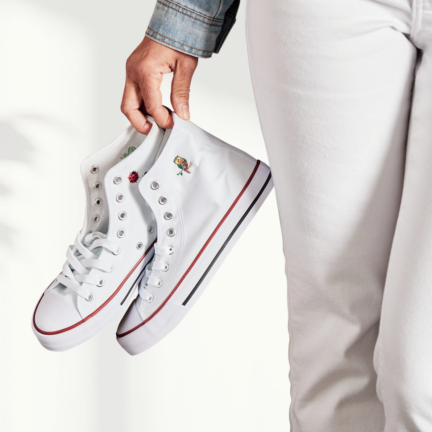 Image of a pair of shoes with embroidery completed on a Brother Entrepreneur One PR1x embroidery machine